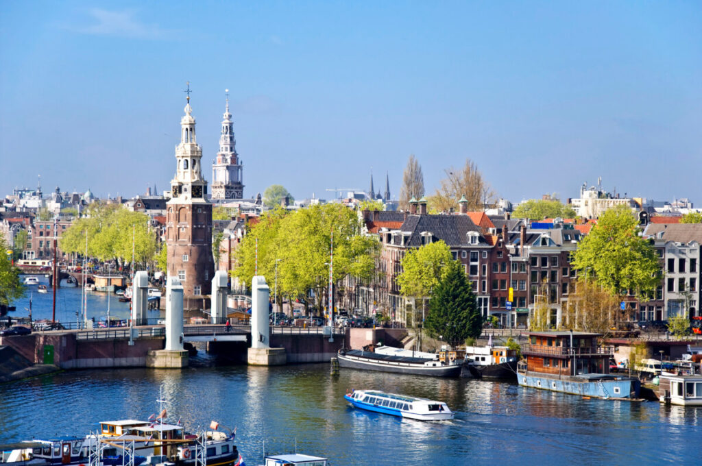 Aerial view of Amsterdam showcasing its iconic canals, unique architecture, and vibrant cityscape