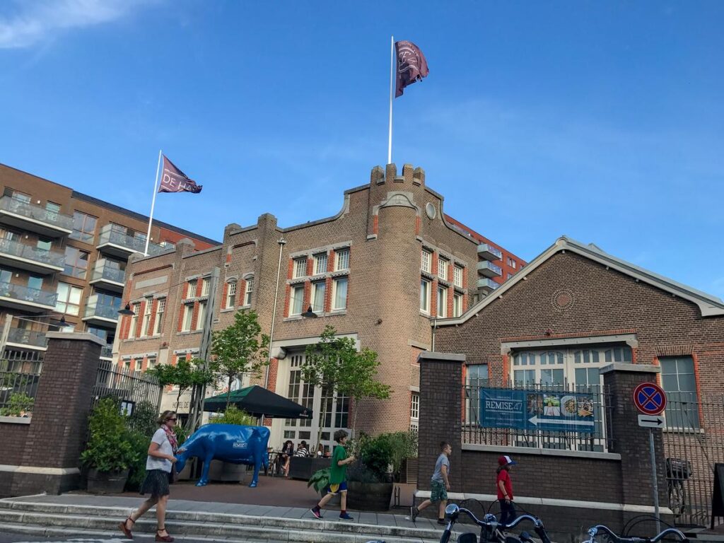 Amsterdam Foodhallen entrance with a blue cow sculpture