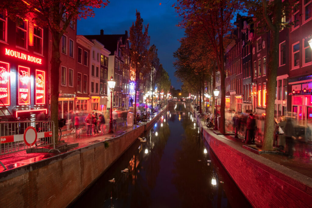 The canal at night at the Red Light District in Amsterdam, Netherlands