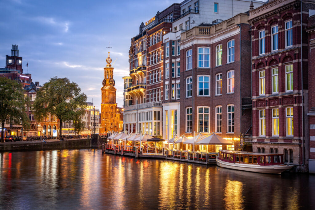 Restaurant by the canals in Amsterdam, Netherlands, illuminated at night