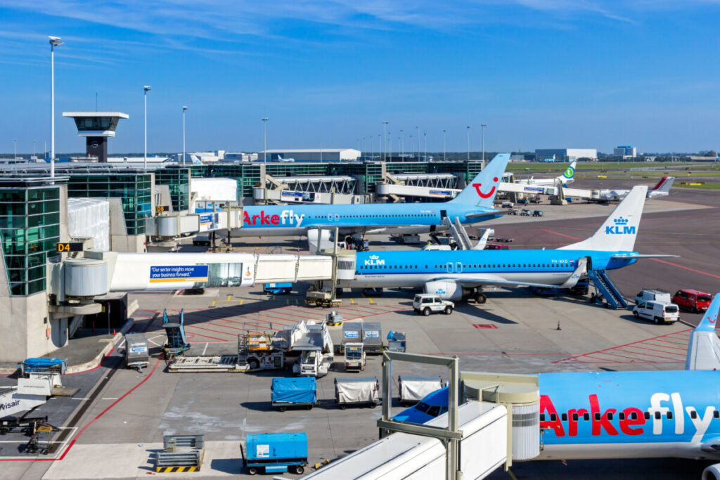 KLM and ArkeFly passenger planes at Schiphol Airport in Amsterdam, Netherlands