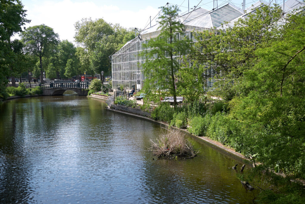 Canal and the De Hortus Botanical Garden in Amsterdam, Netherlands