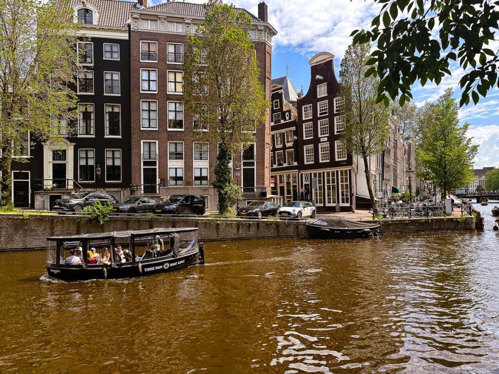 Boat cruise at the Herengracht Canal in Amsterdam, Netherlands