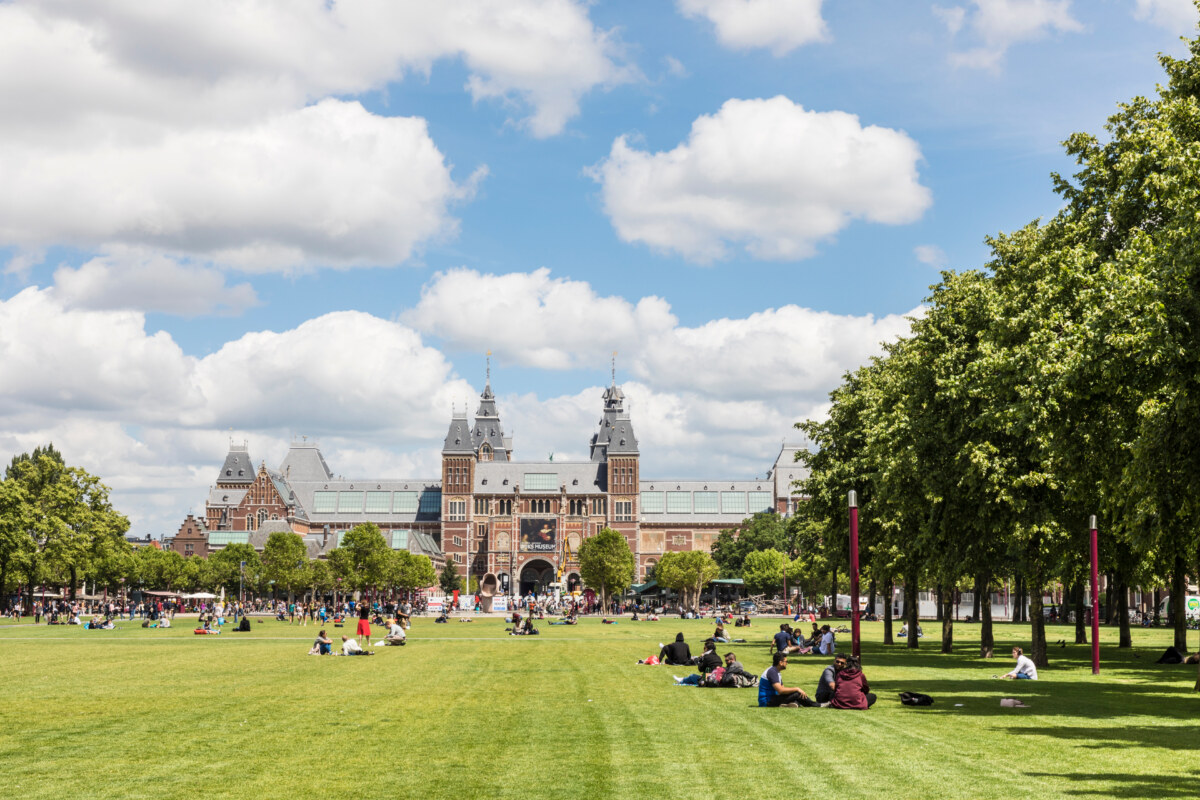 Panoramic view of a park and the building of Rijksmuseum in Amsterdam, Netherlands